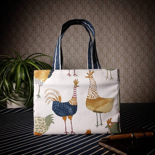 Mini tote bag with multi-colour hens design on beige background