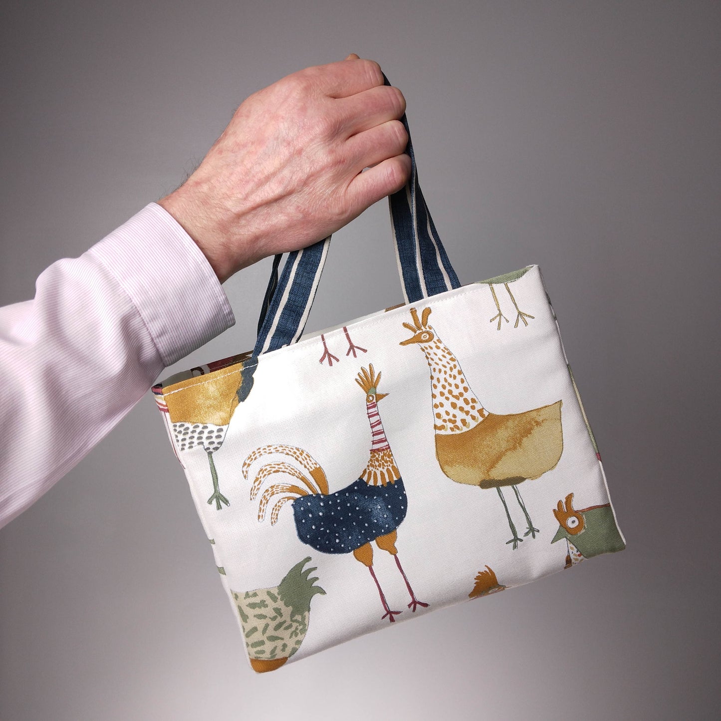 Hand held mini tote bag