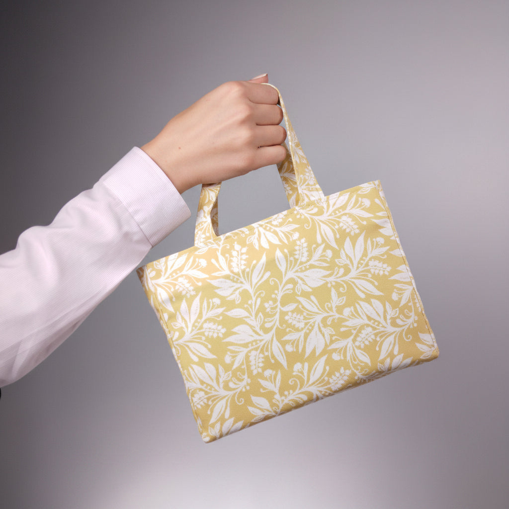 Hand held mini tote bag