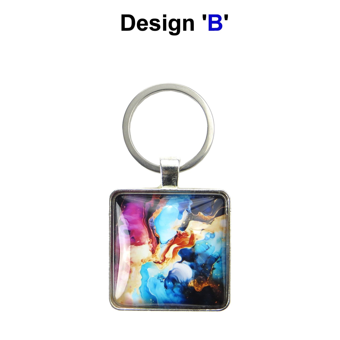Keyring with a glass domed pink, blue, and yellow abstract image