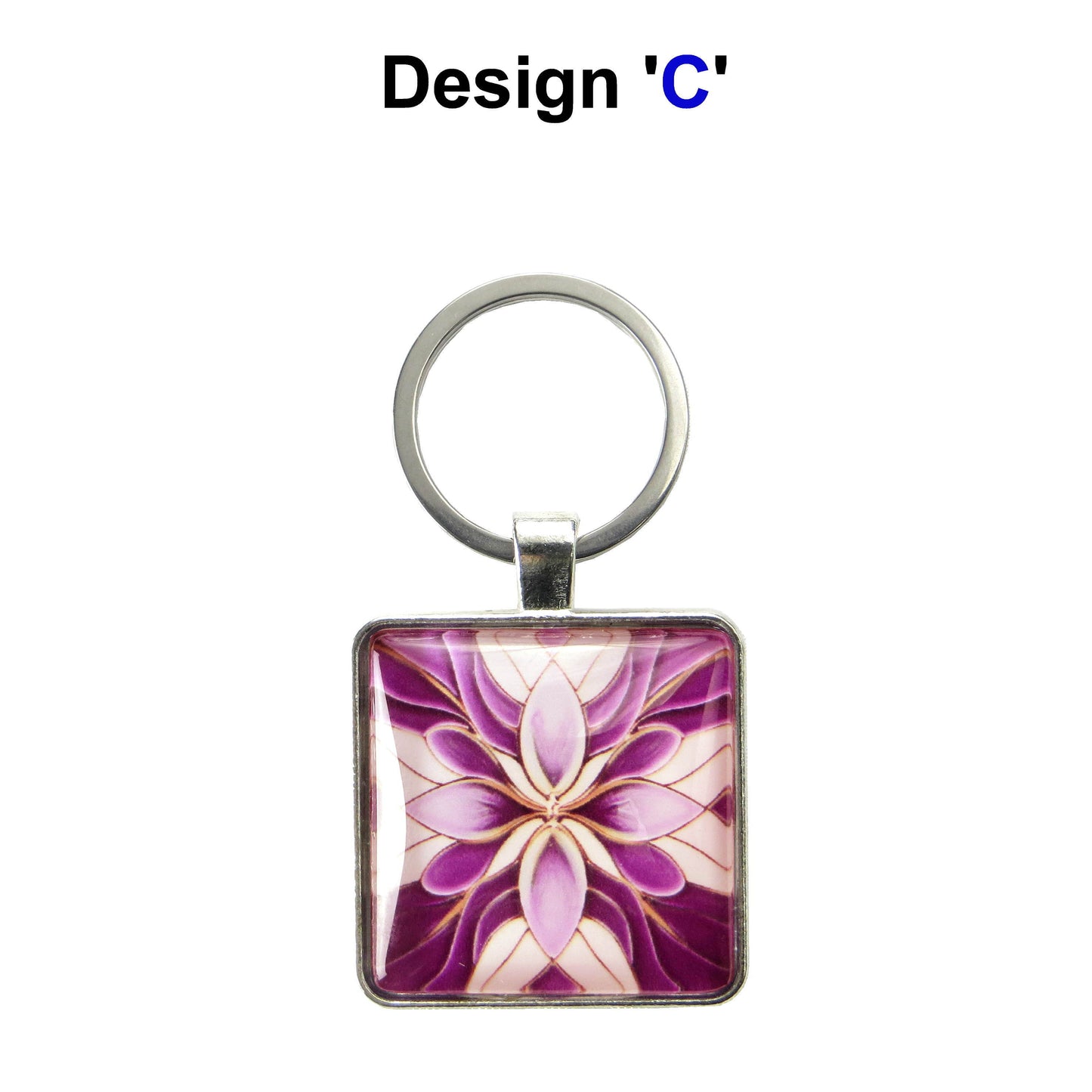 Keyring with a colourful glass domed image