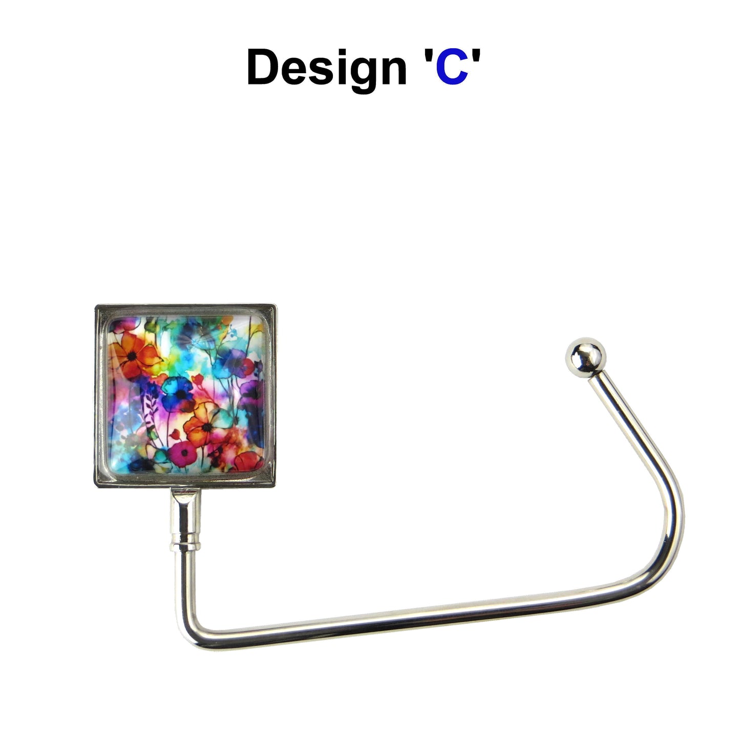 Handbag hook with glass domed image for hanging accessories on tables, ledges, and shelves