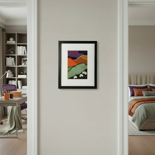Framed fabric artwork with a hillside landscape featuring highland sheep