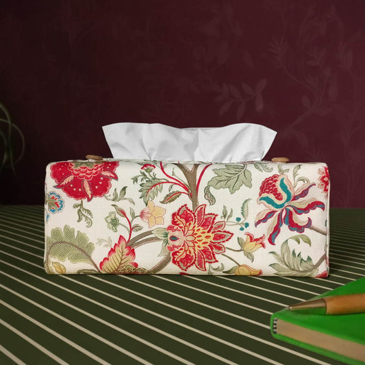 Linen rectangle tissue box cover with a pen, notebook, and plant