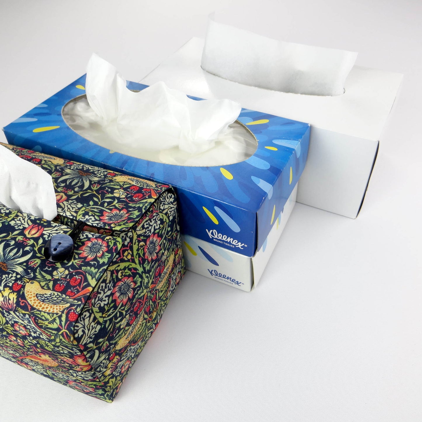 Rectangle tissue box cover with birds and berries design on dark blue background