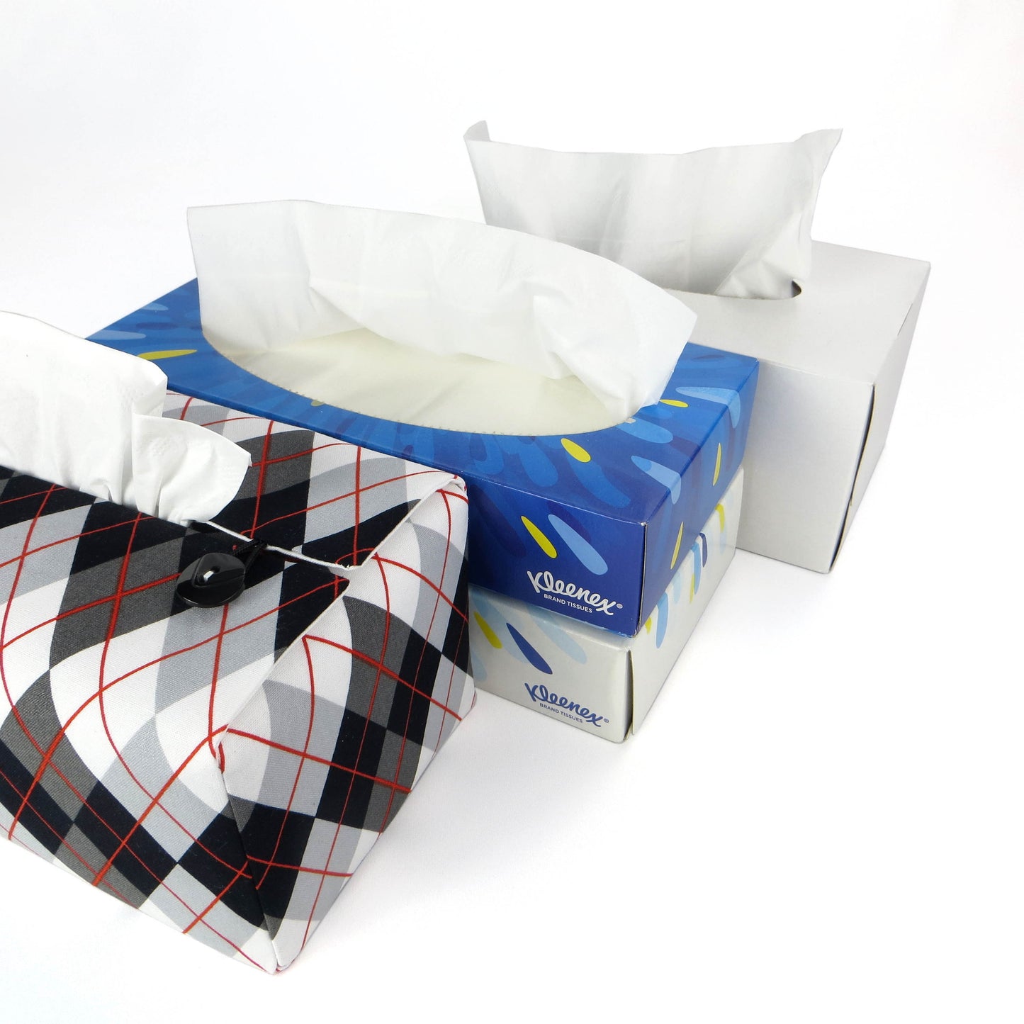 Rectangular tissue box cover with black, grey, and red argyle pattern