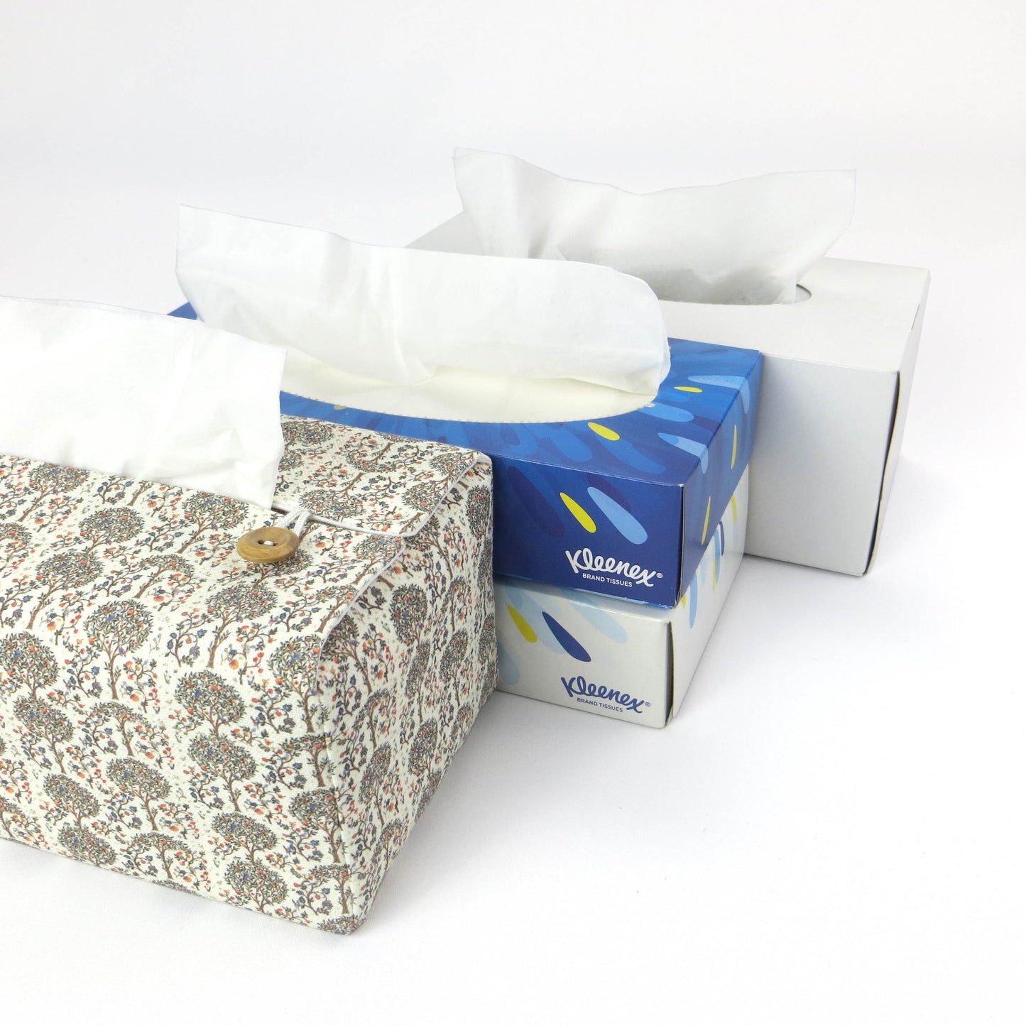 Linen rectangle tissue box cover with a mini orchard grove pattern