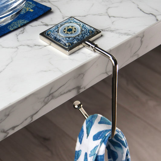 Handbag hook hanging on a table