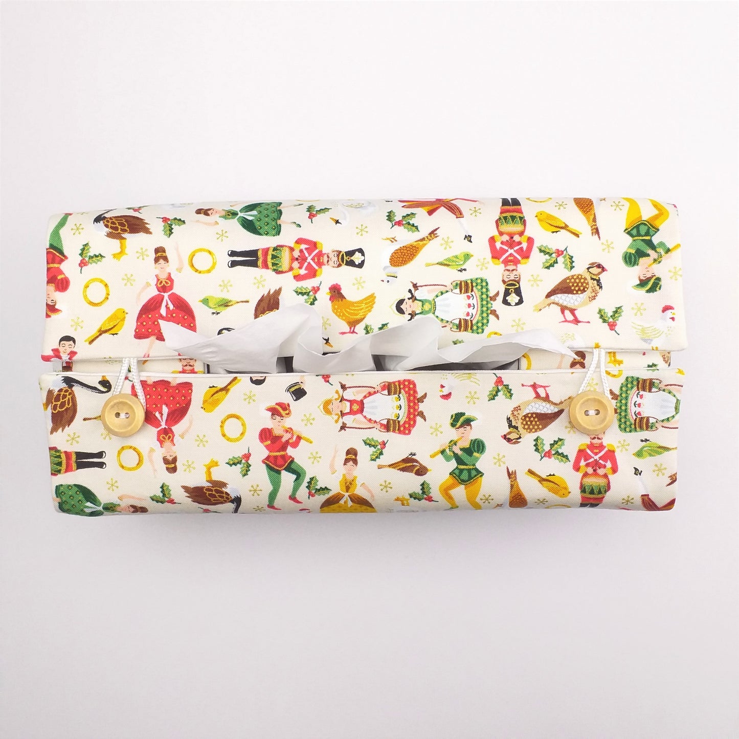 Top view of rectangular tissue box cover with buttons