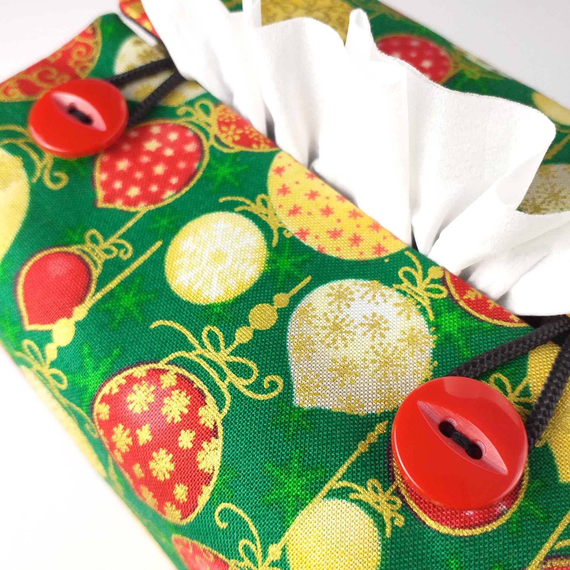 Close up of square tissue box cover with buttons