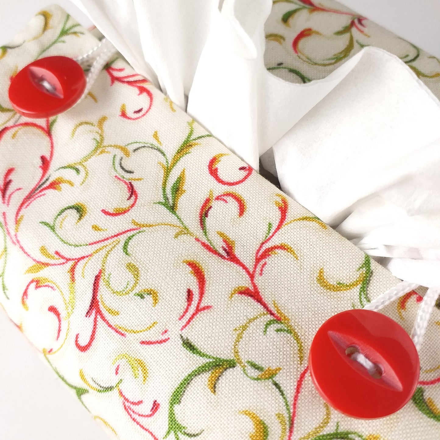 Close up of square tissue box cover with buttons