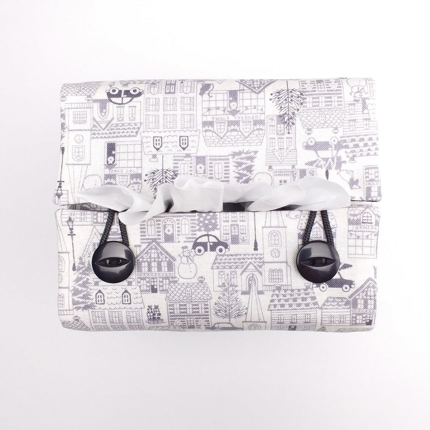 Top view of square tissue box cover with buttons