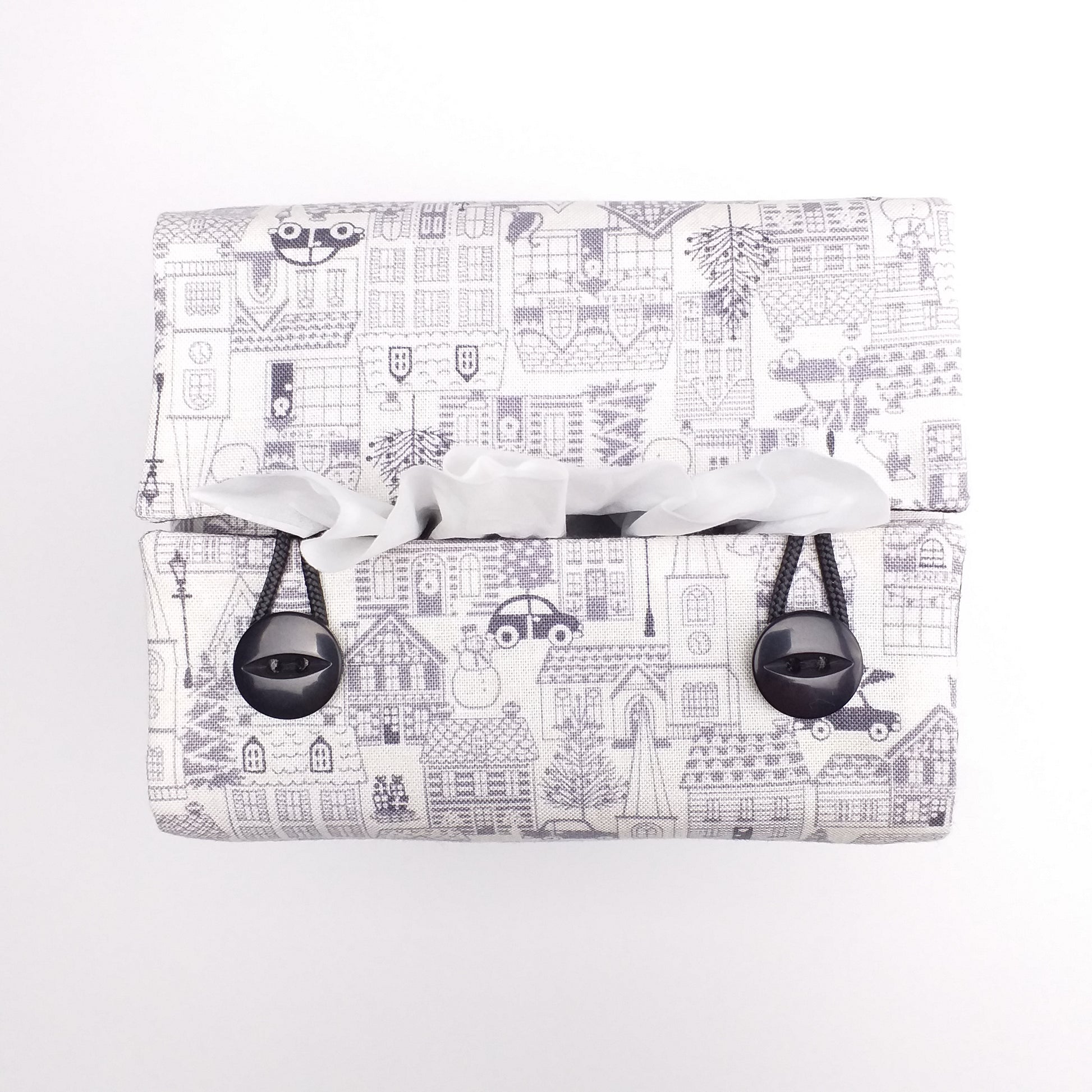 Top view of square tissue box cover with buttons