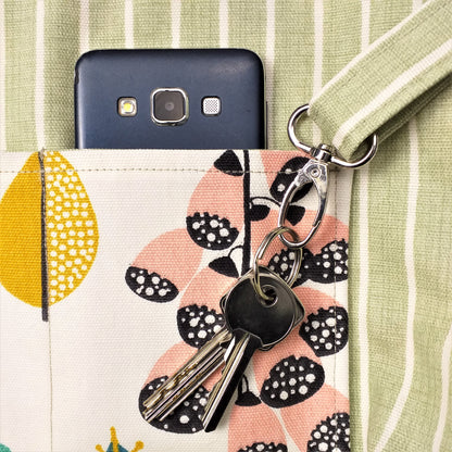 Close up view of a large tote bag interior key clasp