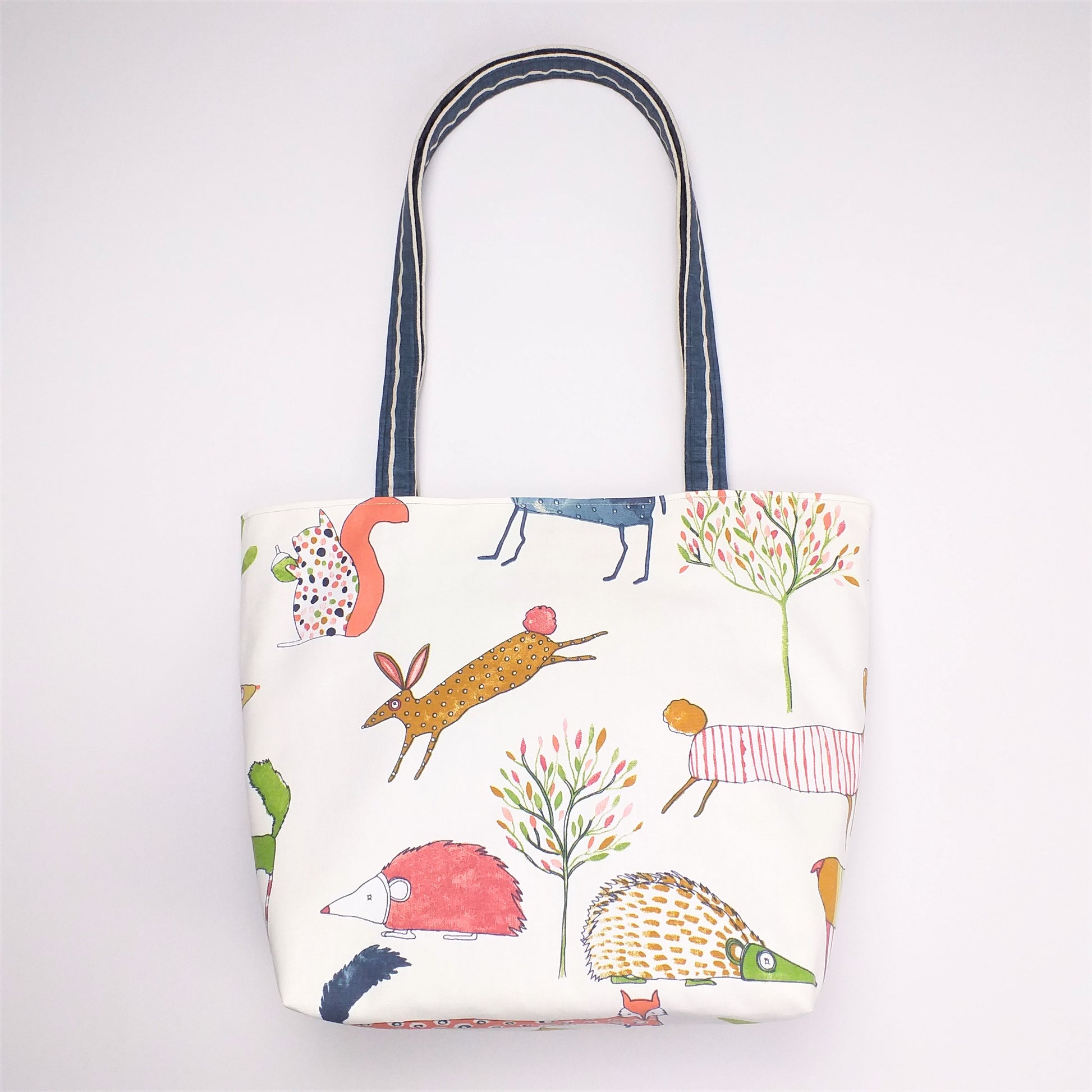Back view of large tote bag with forest animal design