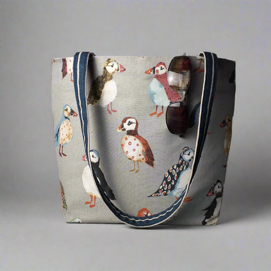 Large tote bag with multi-colour puffins design on grey background