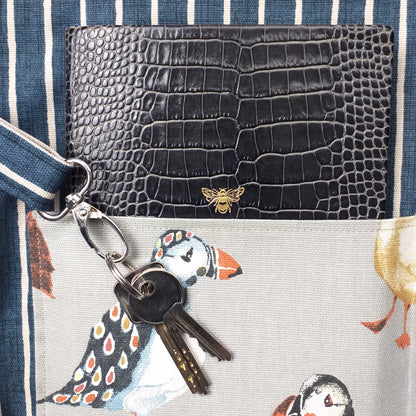 Close up view of a large tote bag interior key clasp