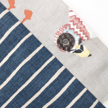 Close up view of a large tote bag magnetic closure