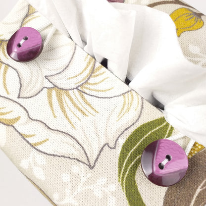 Close up view of square tissue box cover with buttons
