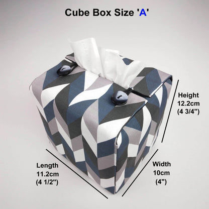 Square tissue box cover with blue, grey, white and black herringbone pattern