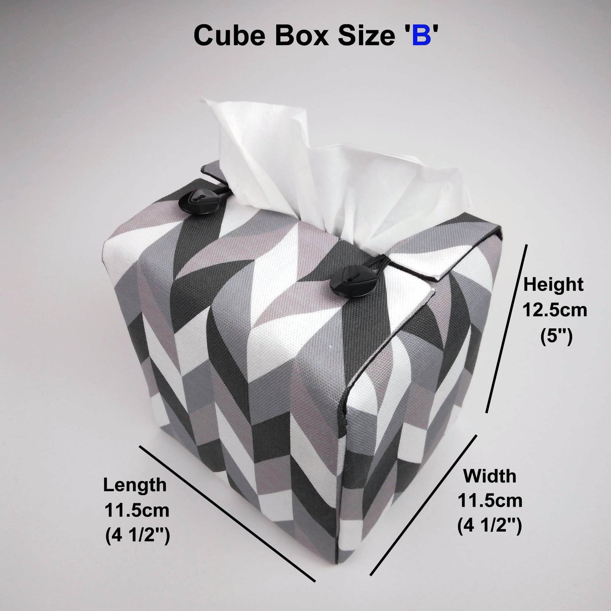 Square tissue box cover with grey, white and black herringbone pattern