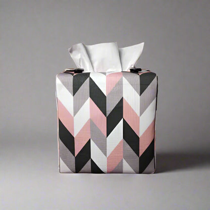 Square tissue box cover with pink, grey, white and black herringbone pattern