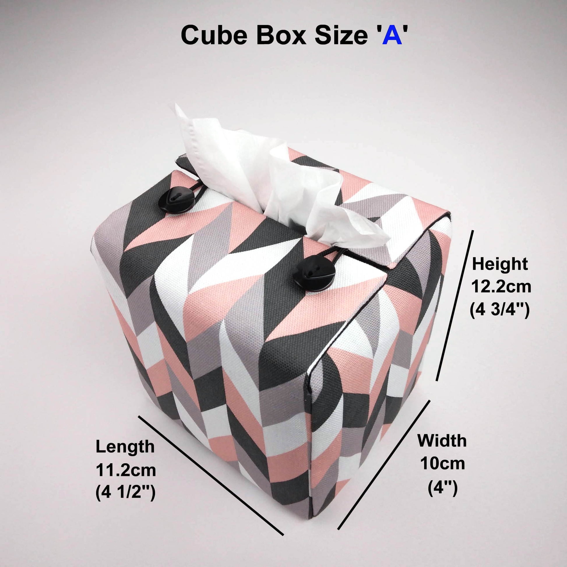 Square tissue box cover with pink, grey, white and black herringbone pattern