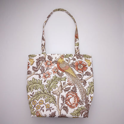 Front view of a large tote bag with pheasants and flowers design on natural colour background
