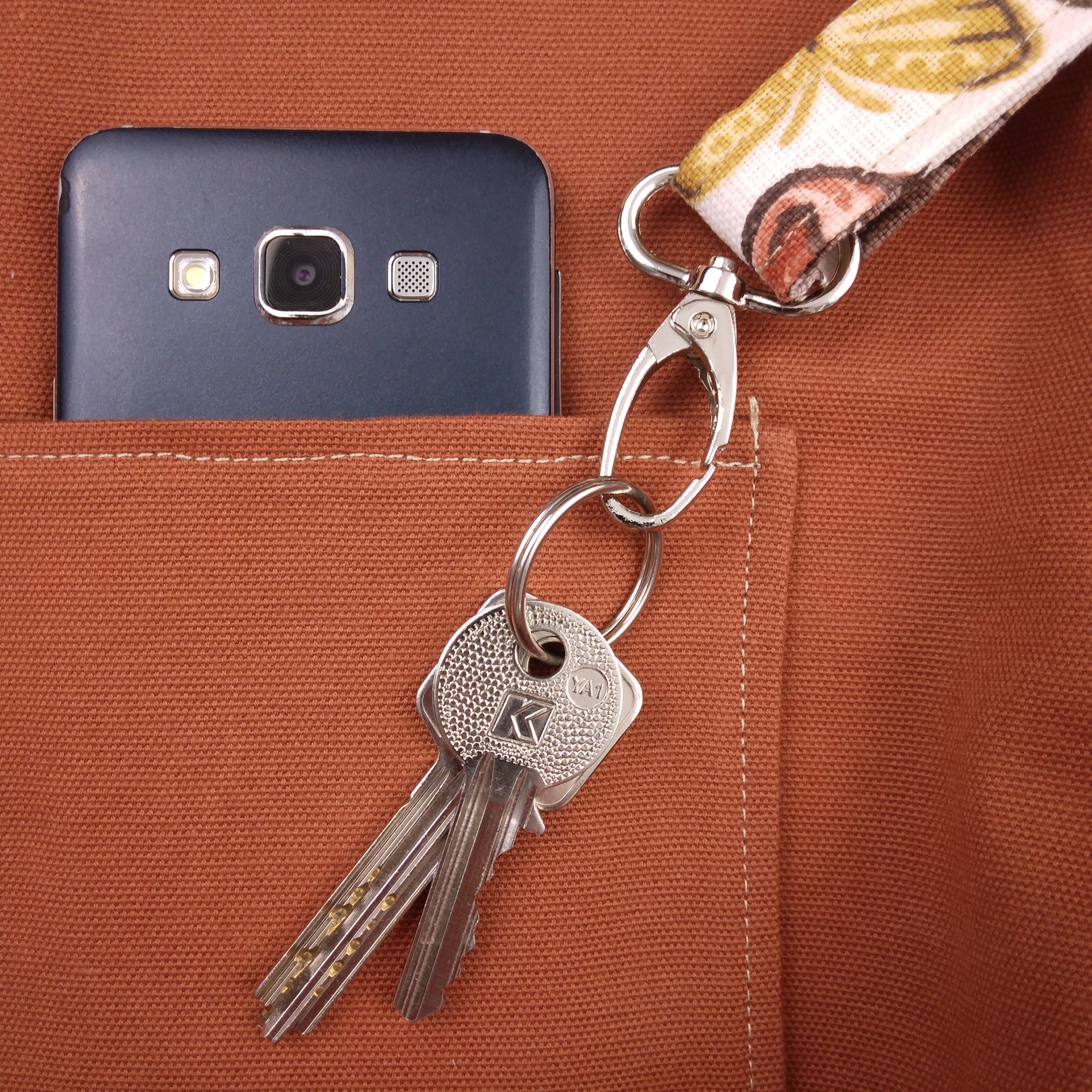Close up view of a large tote bag interior key clasp