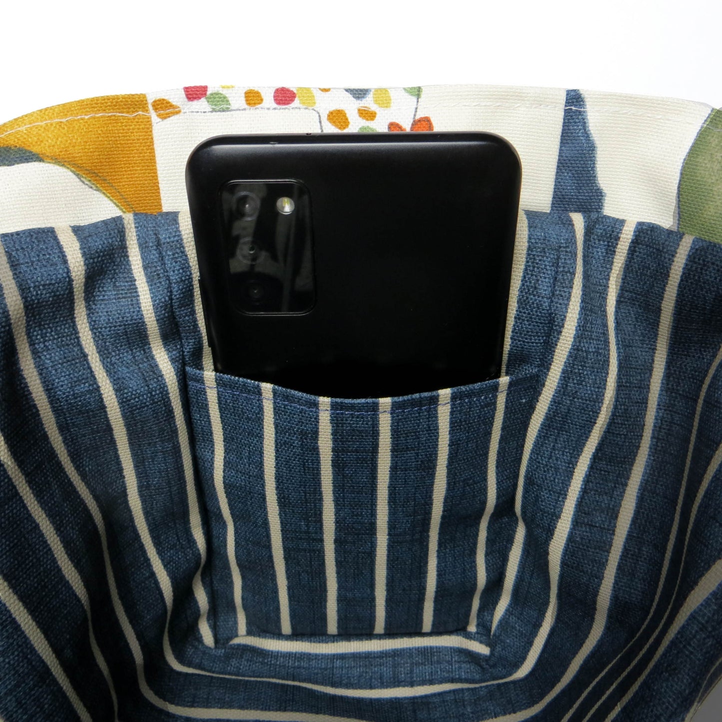 Mini tote bag with multi-colour hens design on beige background