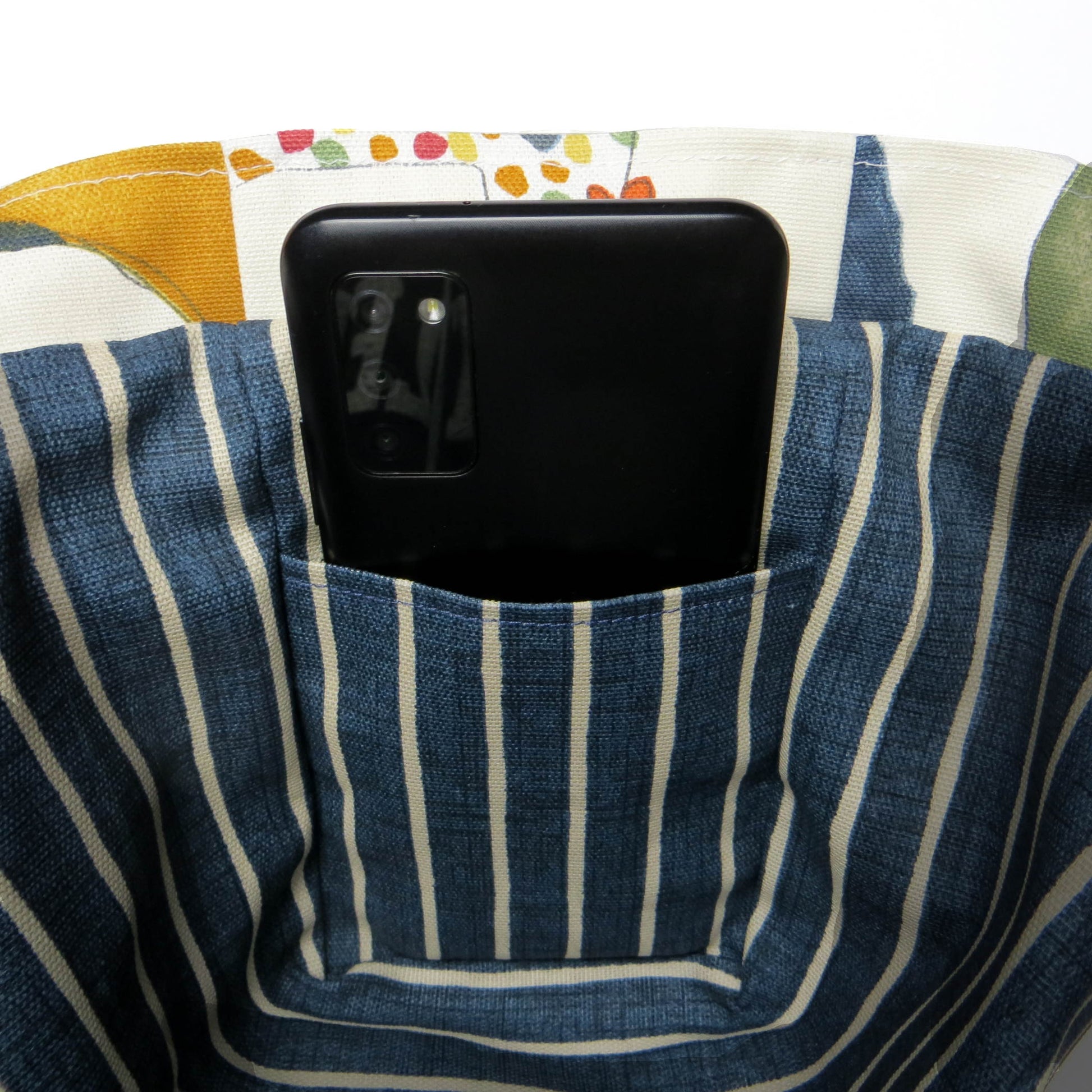 Mini tote bag with multi-colour hens design on beige background