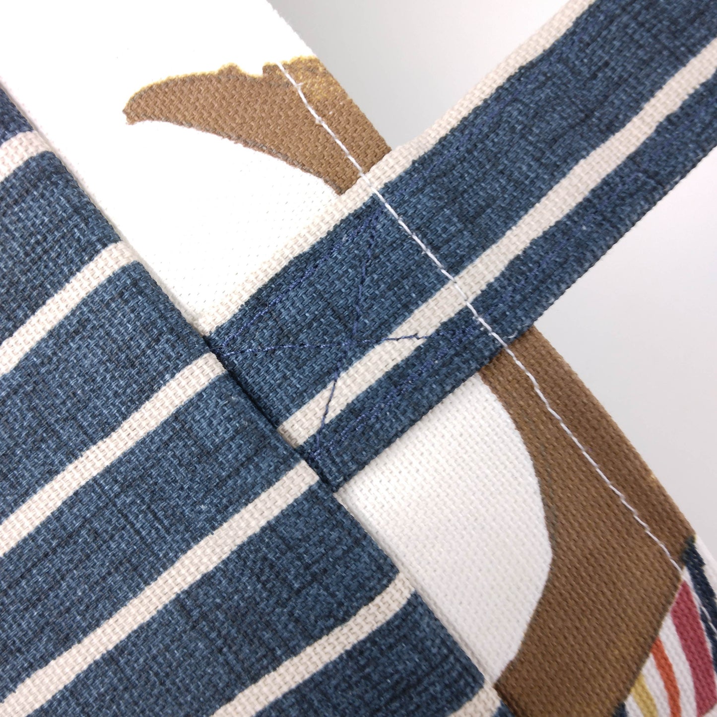 Mini tote bag with multi-colour hens design on beige background