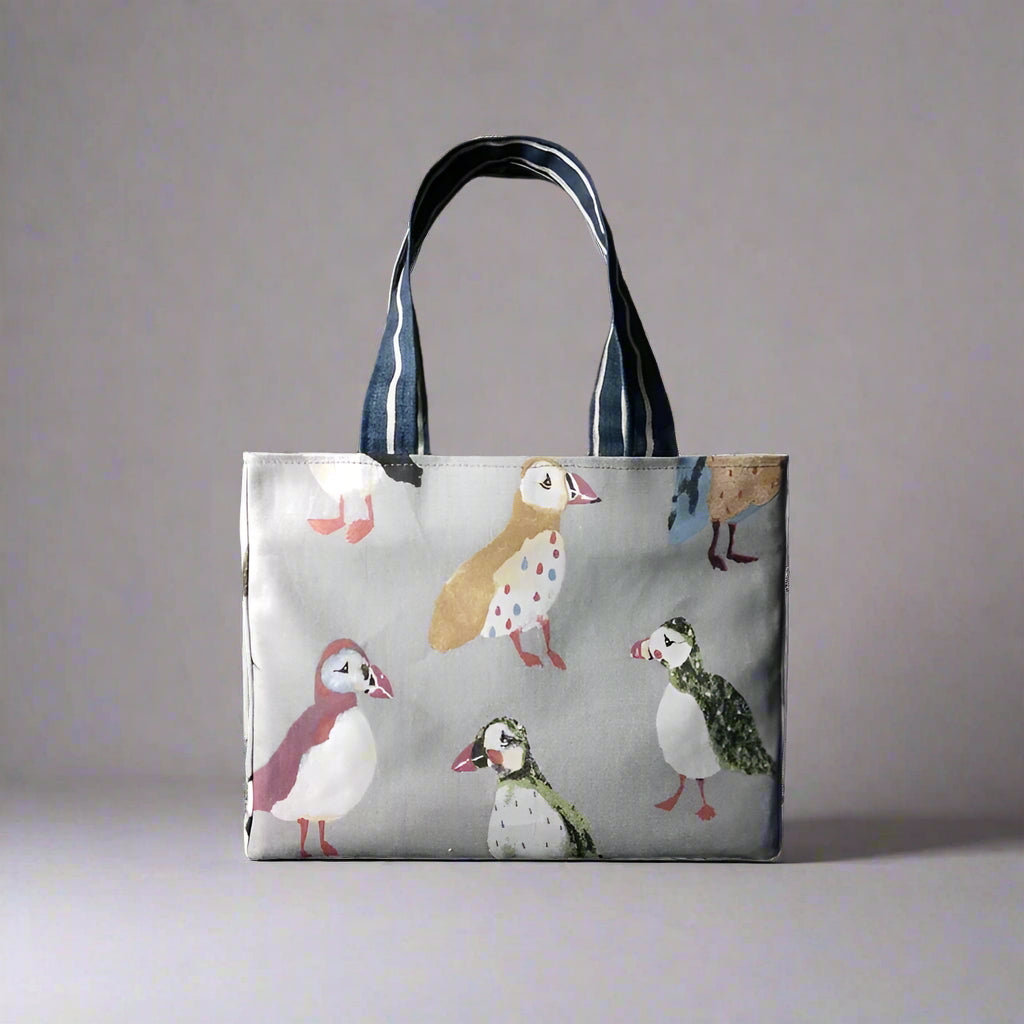 Mini tote bag with multi-colour puffins design on grey background