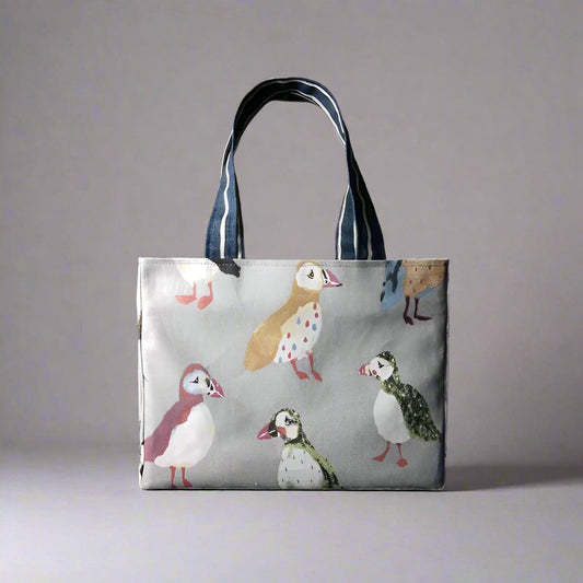 Mini tote bag with multi-colour puffins design on grey background