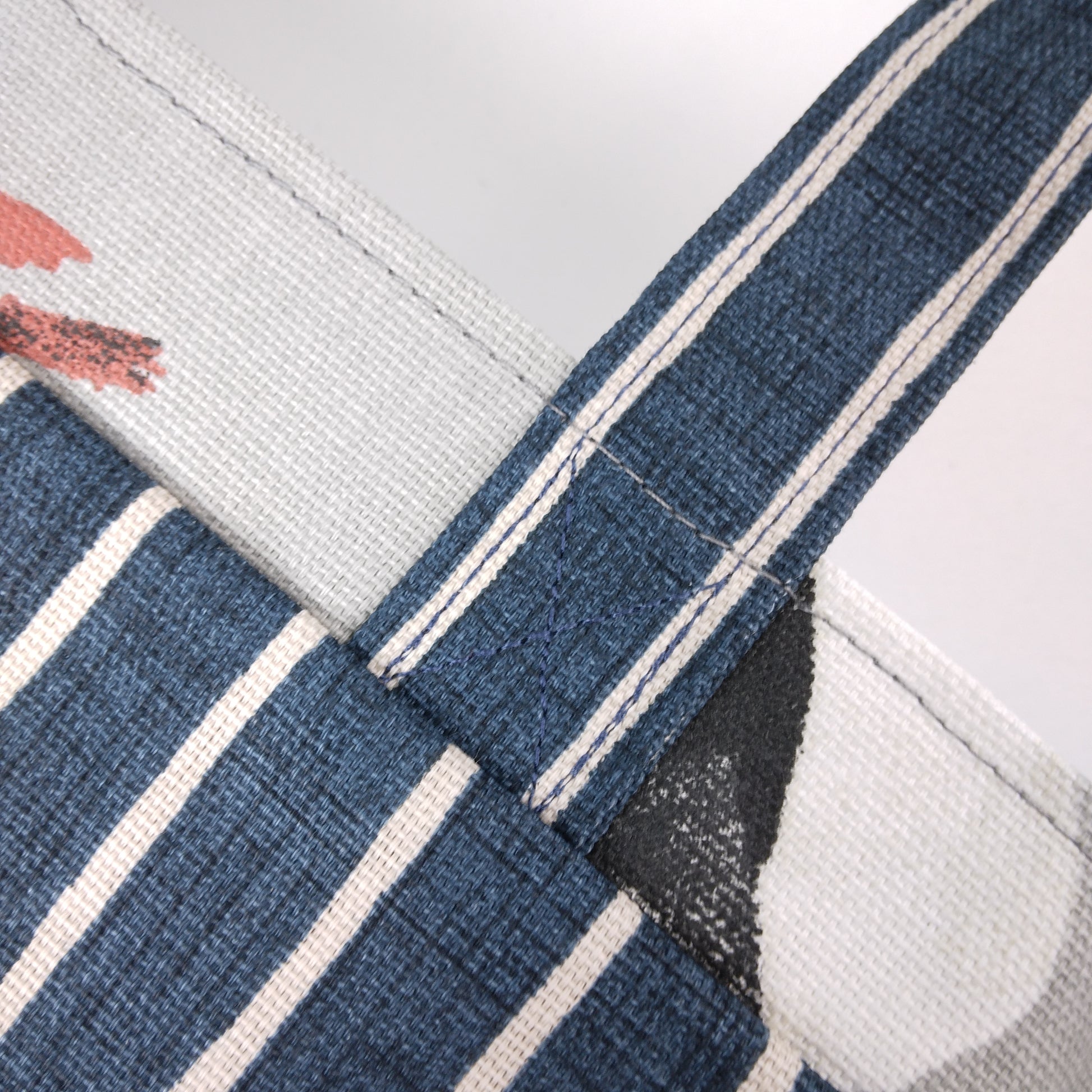 Close up view of a mini tote bag exterior and interior fabric