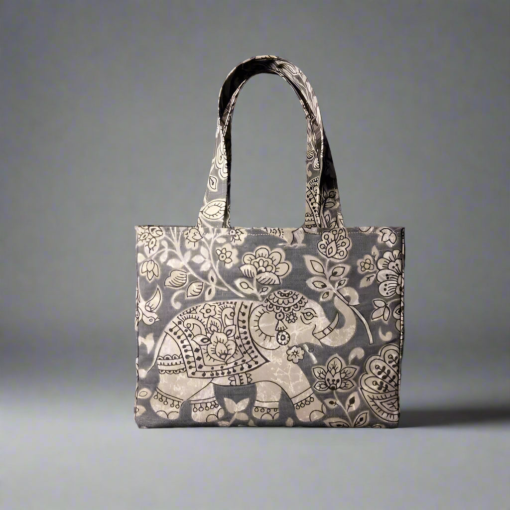 Mini tote bag with ornate taupe elephant design on grey background