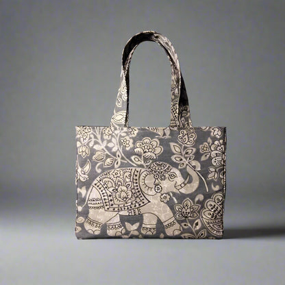 Mini tote bag with ornate taupe elephant design on grey background