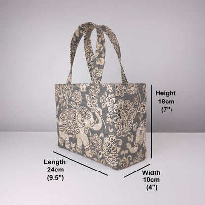 Mini tote bag with ornate taupe elephant design on grey background