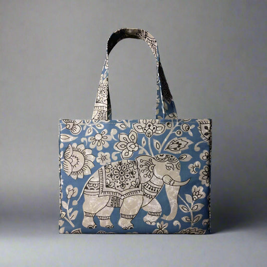 Mini tote bag with ornate taupe elephant design on blue background