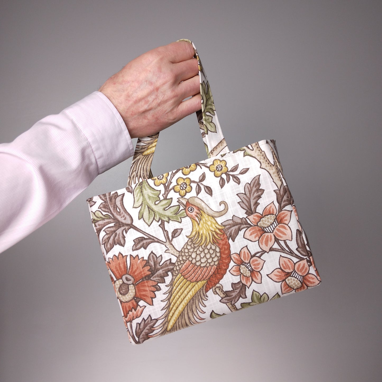 Hand held mini tote bag