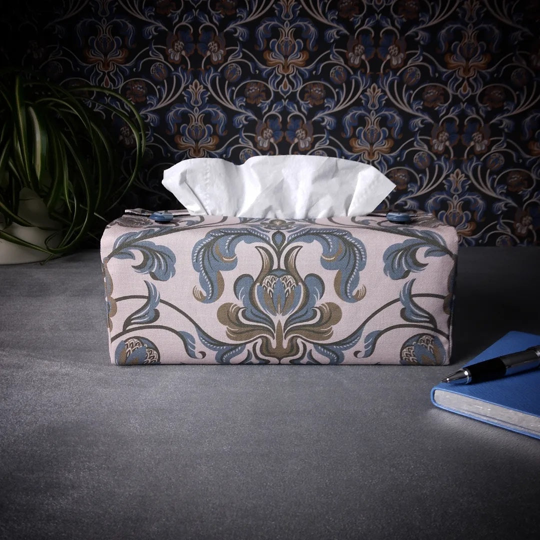 Cotton rectangle tissue box cover with a pen, notebook, and plant