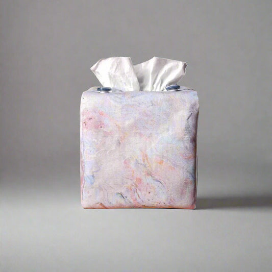 Square tissue box cover with white, orange, pink, blue and grey abstract pattern
