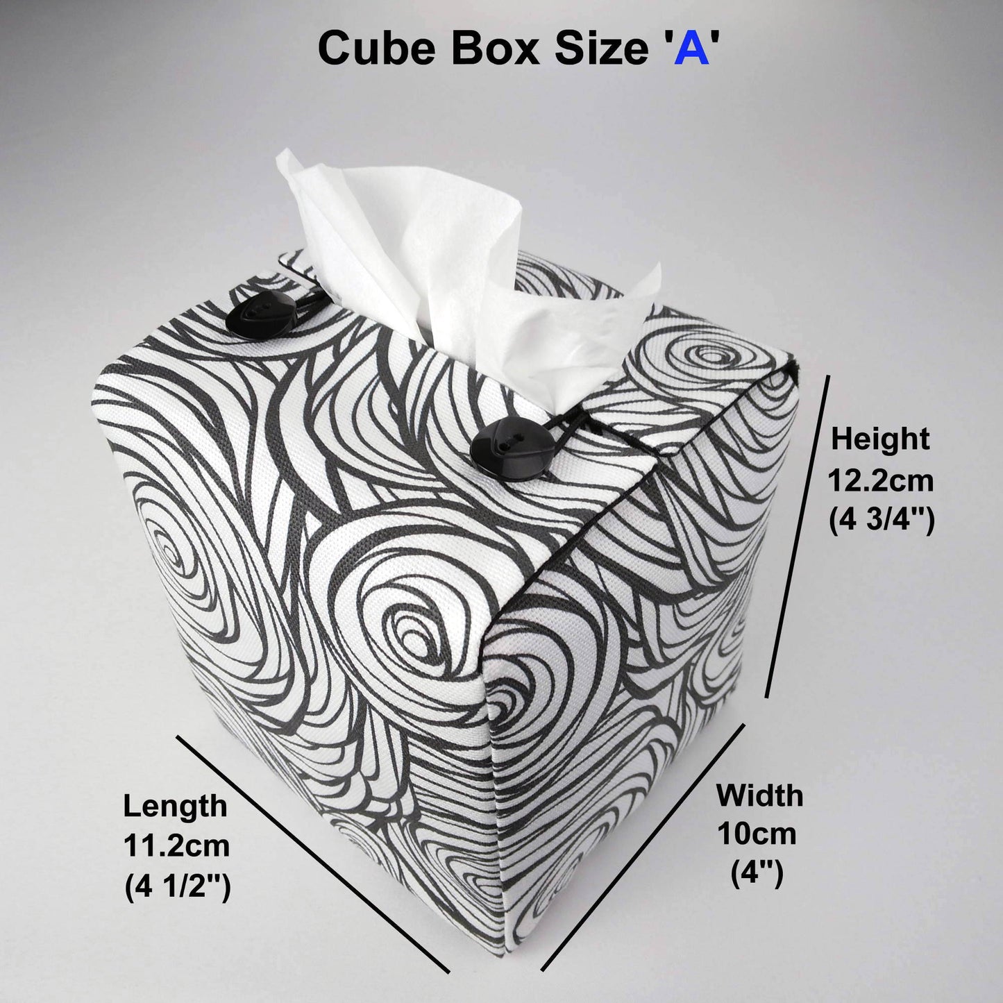 Square tissue box cover with black stylized roses on white background