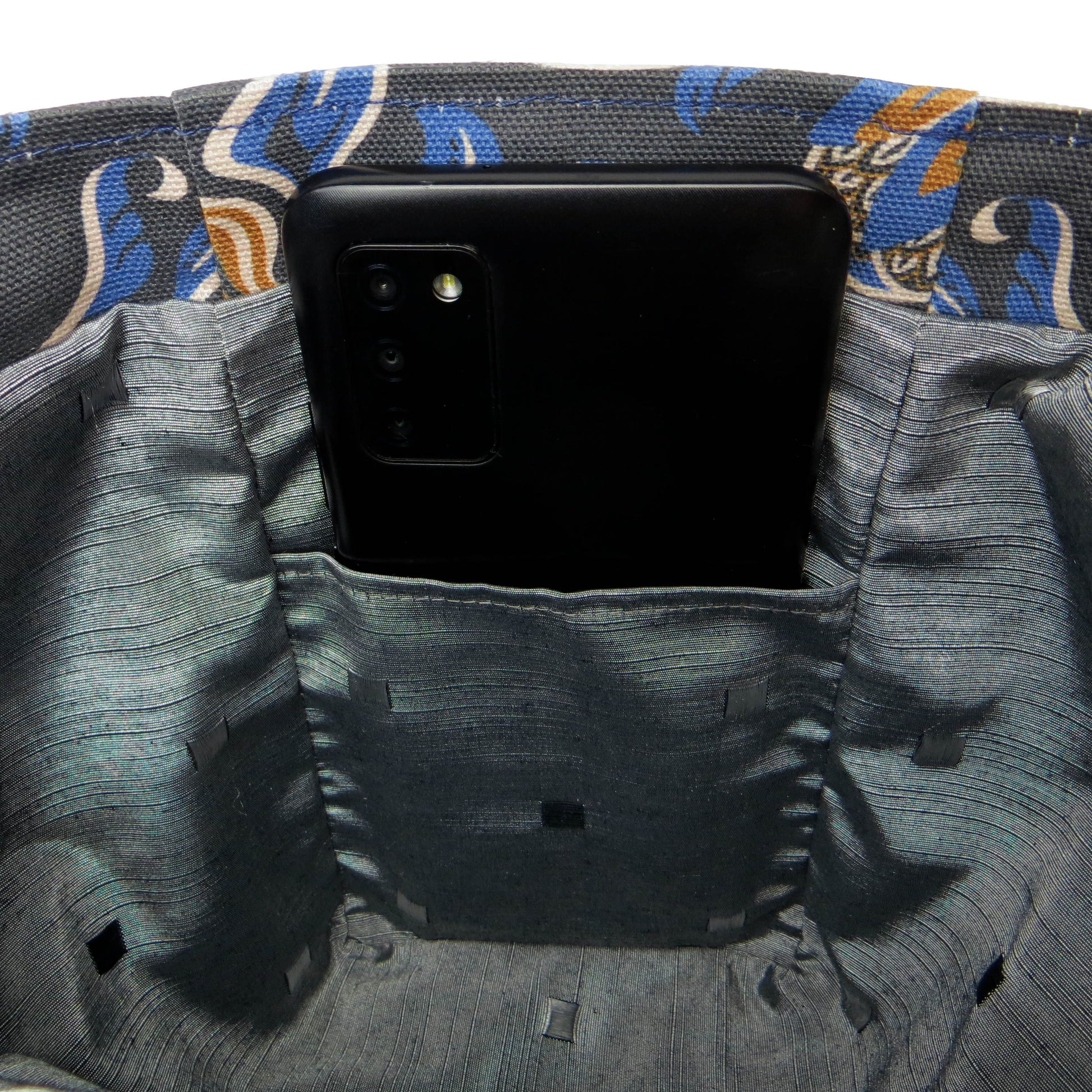 Close up of a mini tote bag interior pocket
