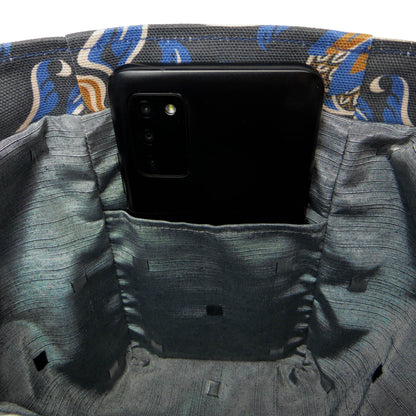 Close up of a mini tote bag interior pocket