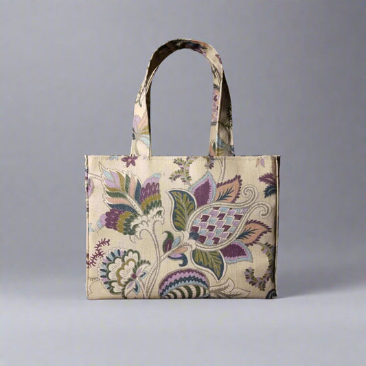 Mini tote bag with multi-colour floral print on beige background