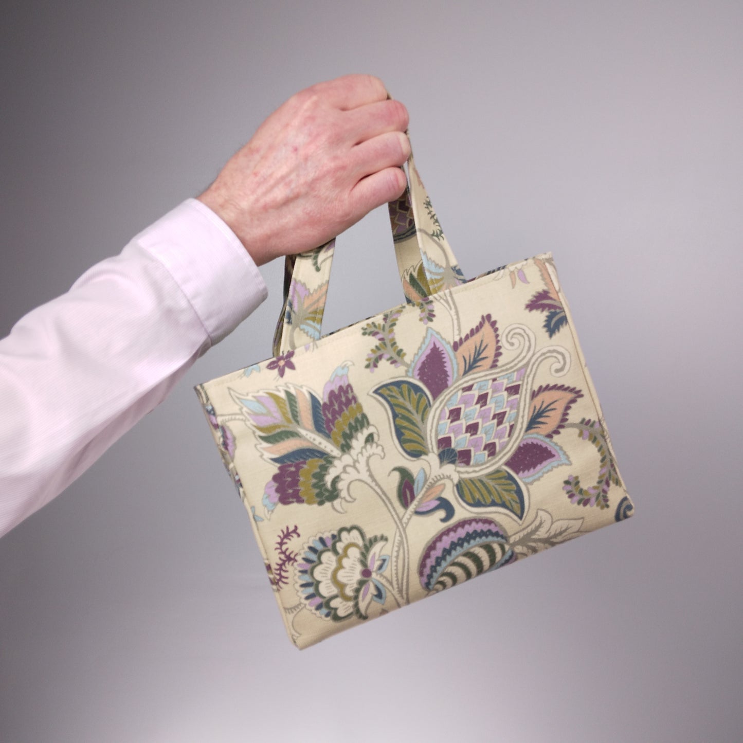 Hand held mini tote bag