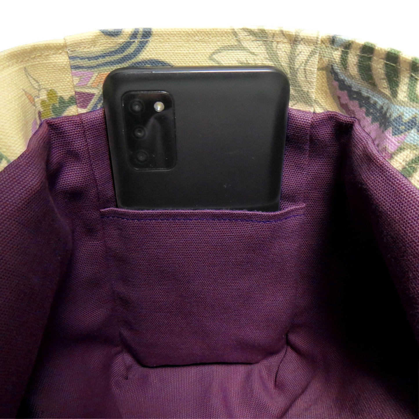 Close up of a mini tote bag interior pocket