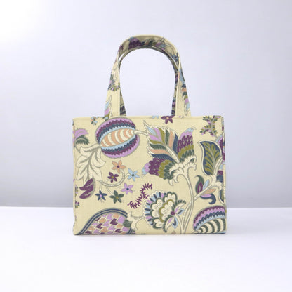 Front view of mini tote bag with multi-colour floral print on beige background
