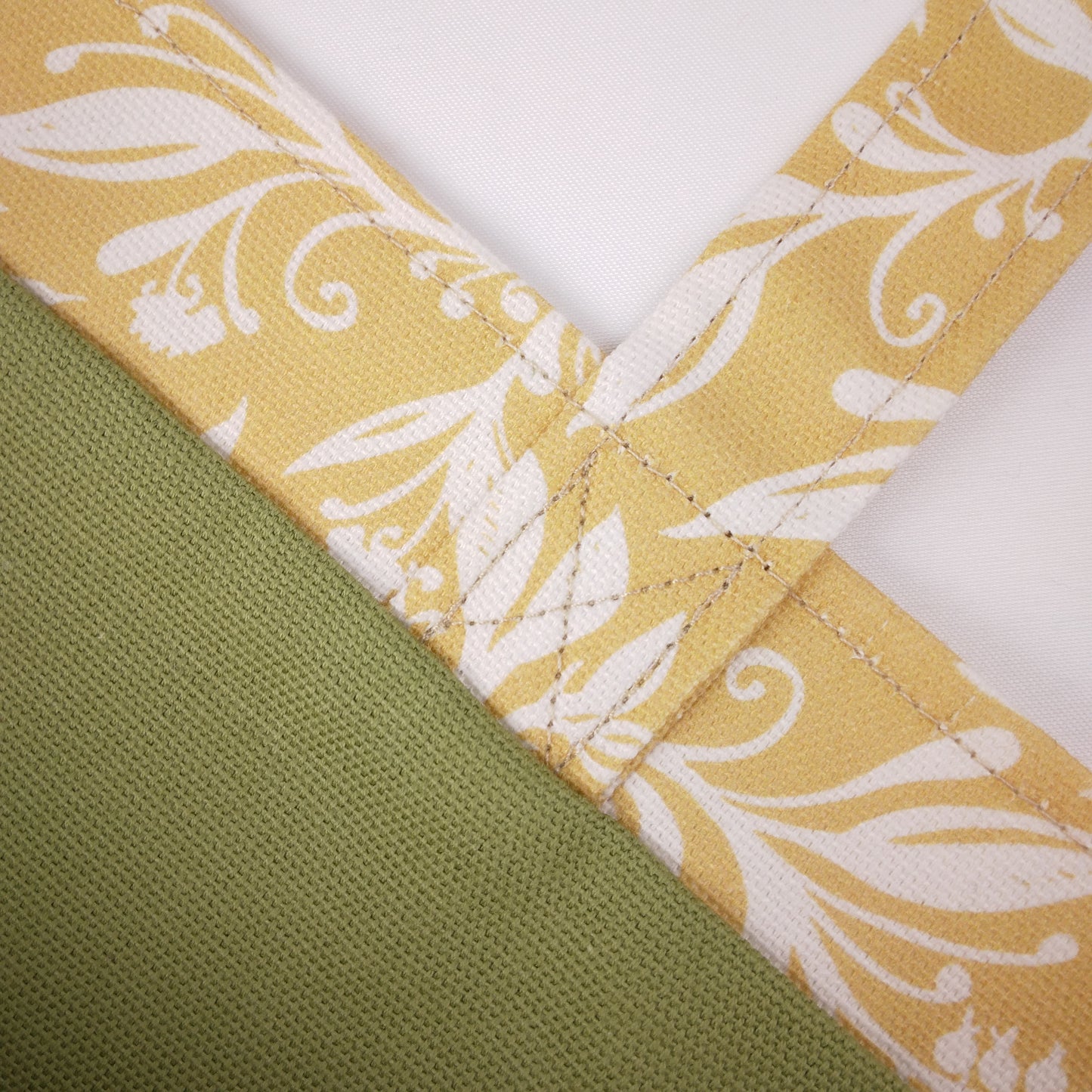 Close up view of a mini tote bag exterior and interior fabric